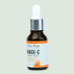 Bottle of Derma Mage MAGE-C serum on a beige background